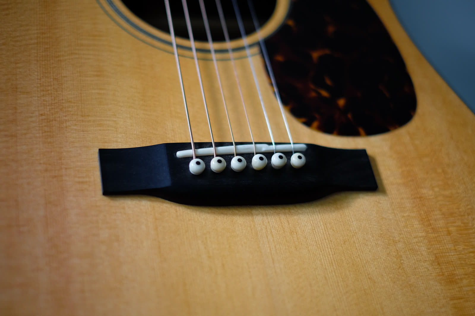 Dreadnought guitar — bridge, ebony with white bridge pins