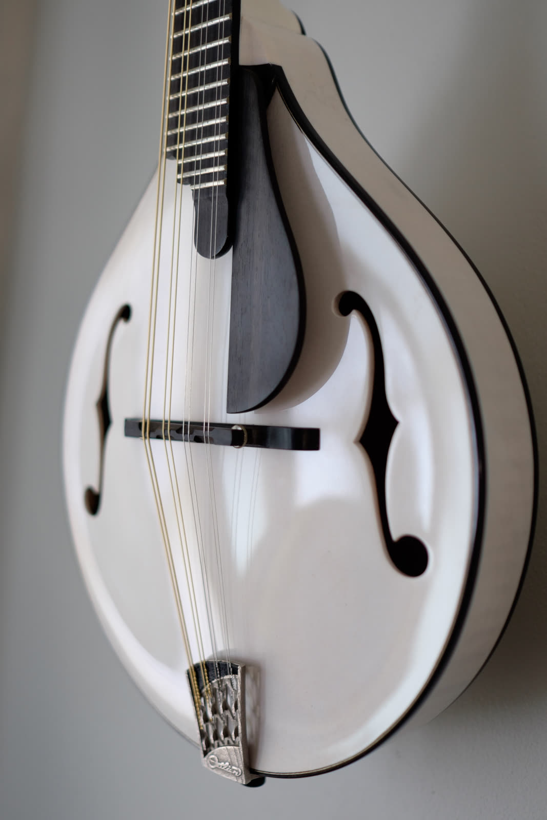 A-model mandolin, pickguard, white nitrocelluose finish