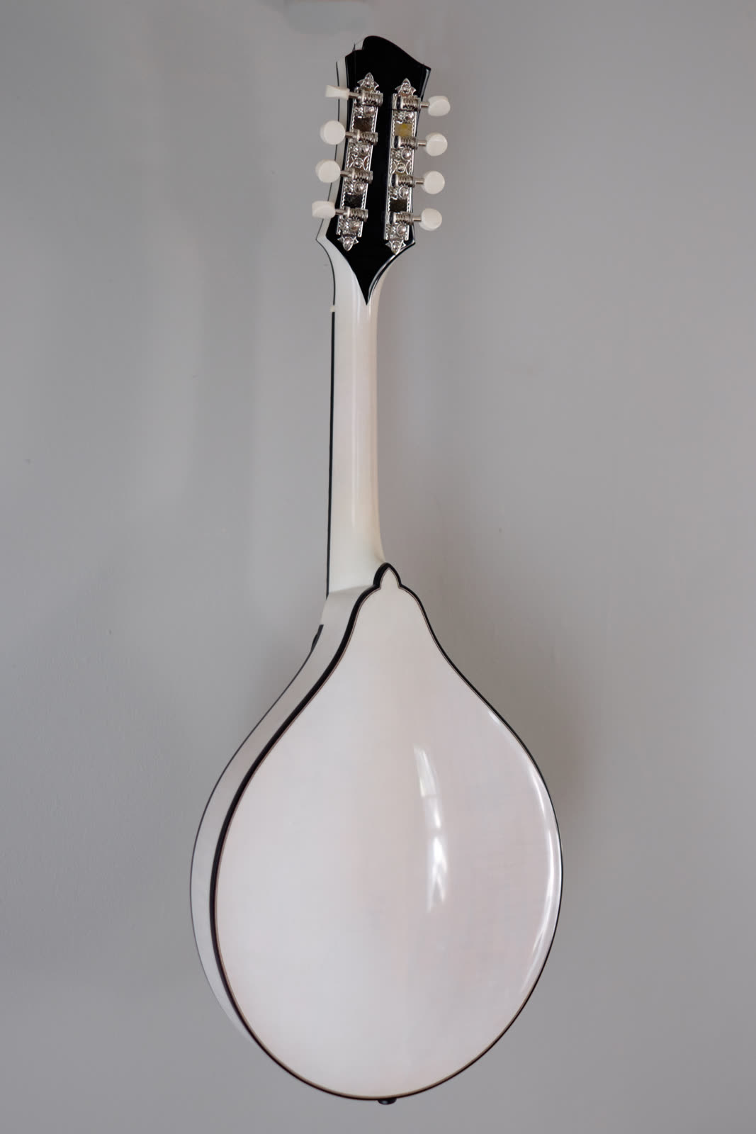 A-model mandolin, back, white nitrocelluose finish