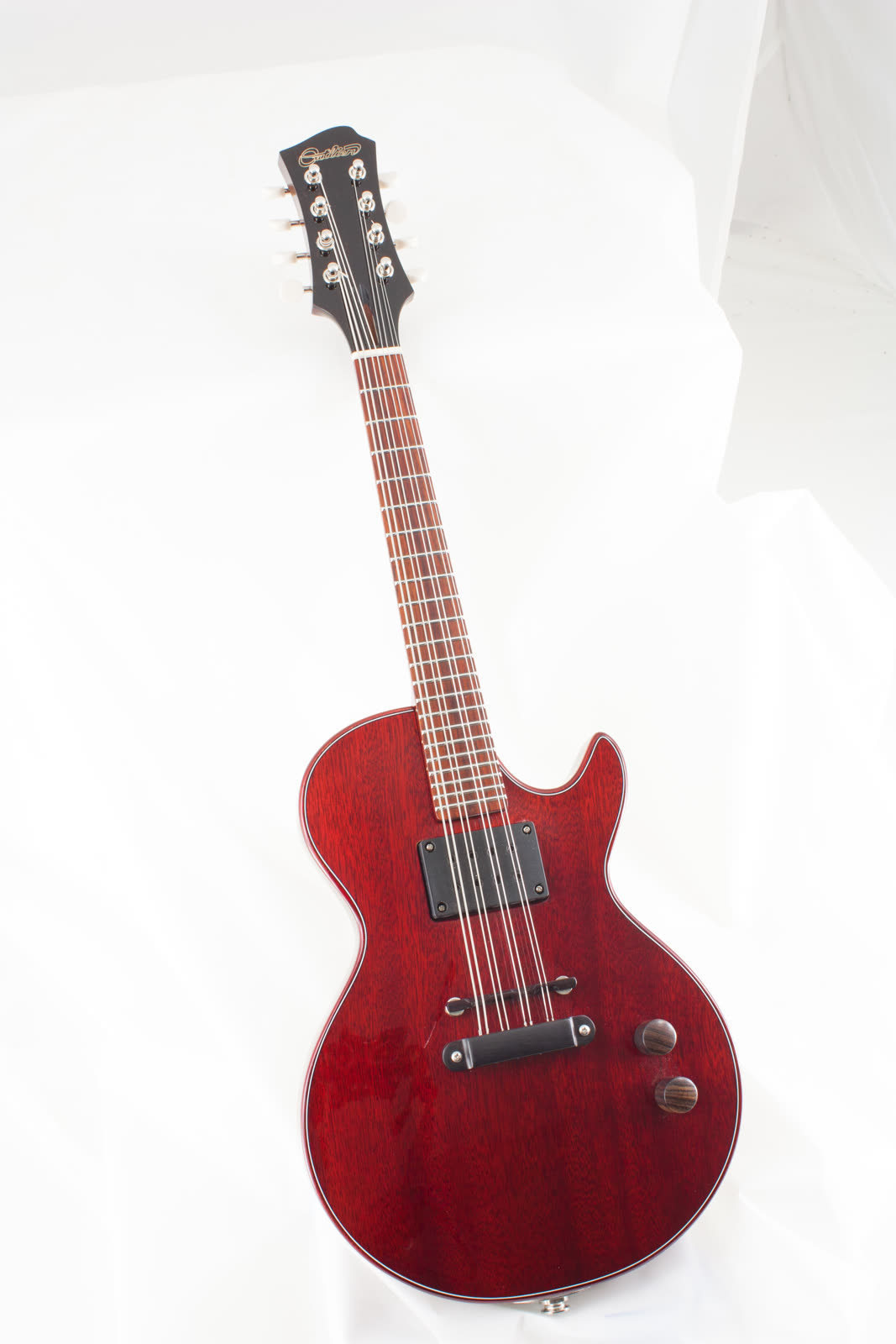 Electric mandolin — front, red lacquer solidbody, slight angle view